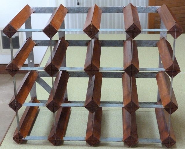 Preview of the first image of WOOD AND STEEL WINE RACK HOLDS UP TO 16 BOTTLES.