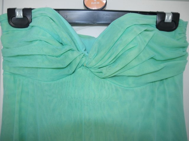 Preview of the first image of Prom & Bridesmaid Dress Green Size 4.