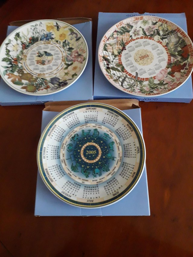 Preview of the first image of Wedgwood Calender plates like new with boxes.