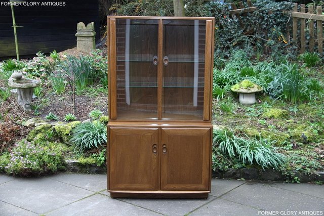 Preview of the first image of ERCOL WINDSOR GOLDEN DAWN DISPLAY CABINET DRESSER SIDEBOARD.