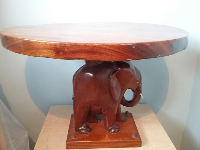 Preview of the first image of Stunning Hardwood Elephant Table.