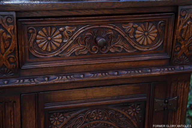 Image 35 of A TITCHMARSH AND GOODWIN CARVED OAK DRESSER BASE SIDEBOARD