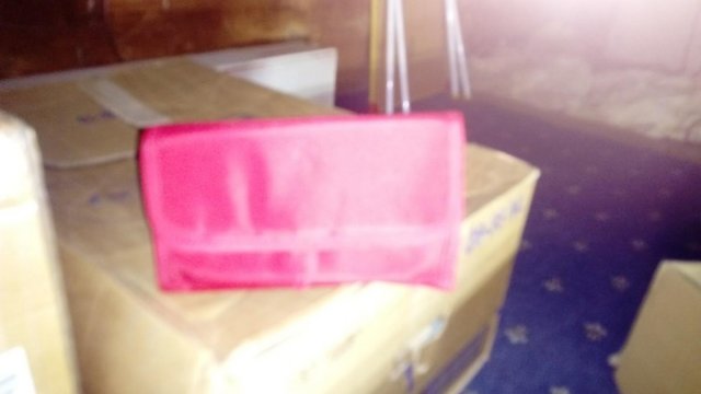Preview of the first image of Make up bag (red New never used).