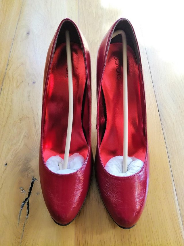 Preview of the first image of BARRATTS RED HIGH HEEL SHOES Leather Wooden Platform Heel.