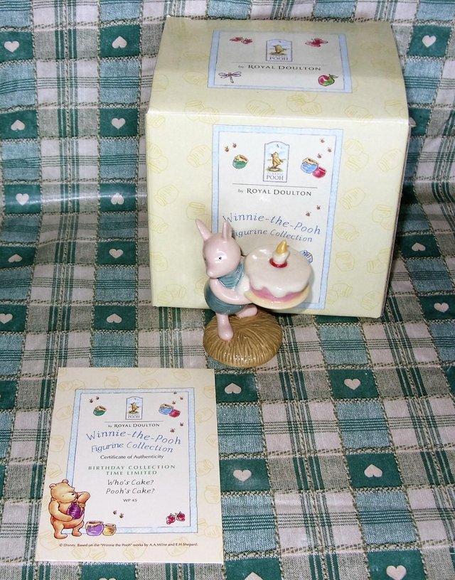 Preview of the first image of Royal Doulton Winnie the Pooh who's cake? poohs cakeboxed.