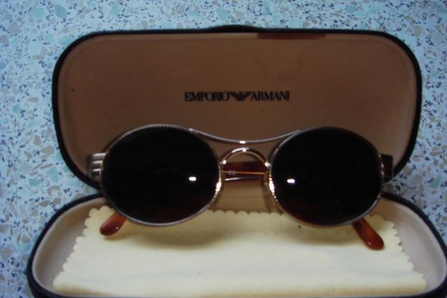 Preview of the first image of VINTAGE ORIGINAL GORGIO ARMANI TORTOISE SHELL AND GOLD SUNGL.