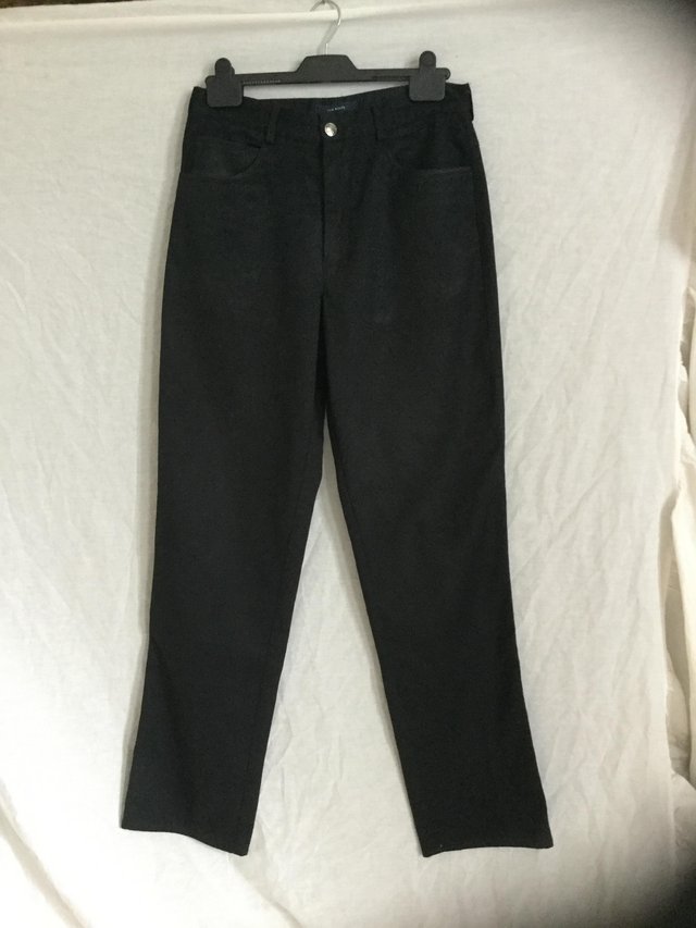 Preview of the first image of Tom Wolfe black casual trousers/ jeans.