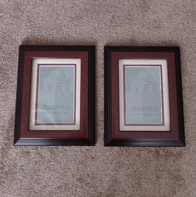 Preview of the first image of 2 Beautiful Solid Wood Photo Frames With A Walnut Finish.