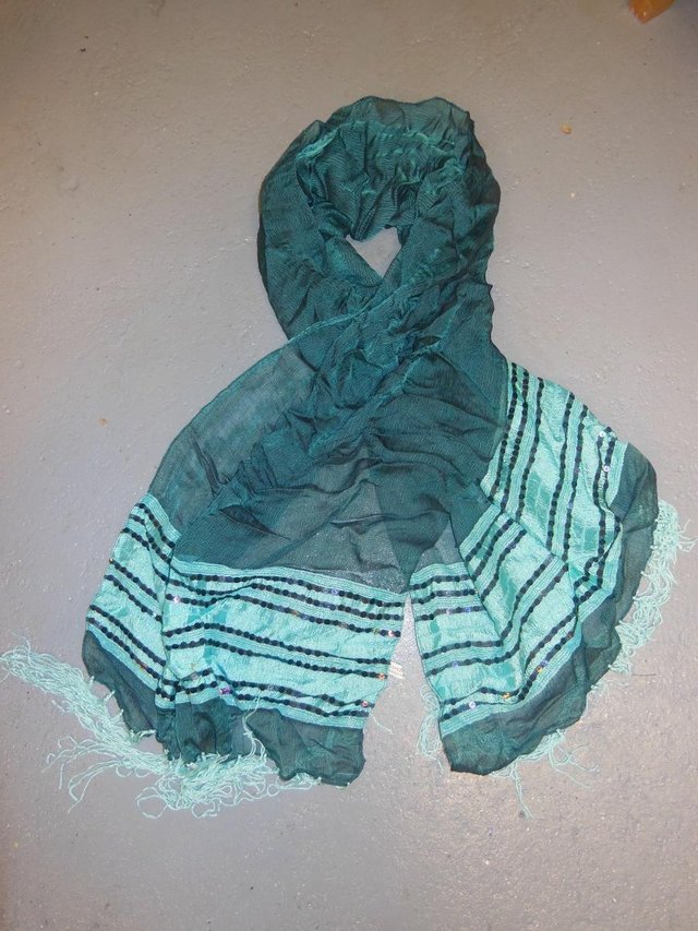 Preview of the first image of Gorgeous ladies green scarf..