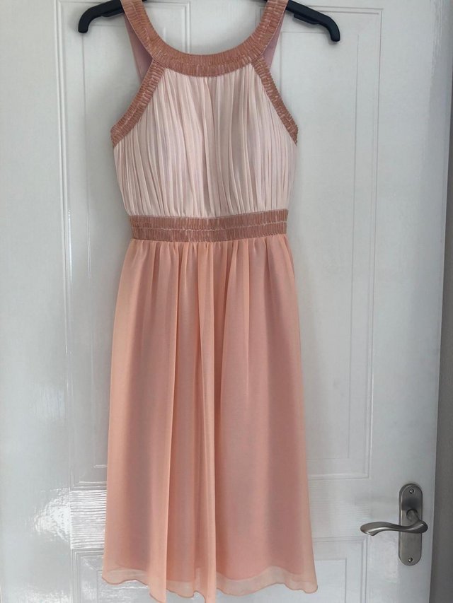 Preview of the first image of Quiz Peach Two Tone Bridesmaid dress.