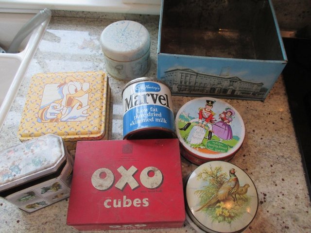 Preview of the first image of 8 collectable tins some vintage.
