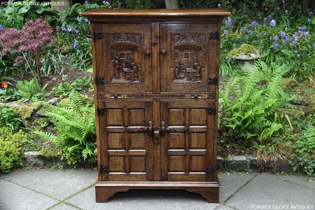 Preview of the first image of A RUPERT NIGEL GRIFFITHS OAK WINE CUPBOARD DRINKS CABINET.