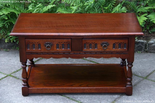 Preview of the first image of OLD CHARM TUDOR BROWN OAK TWO DRAWER TEA COFFEE TABLE STAND.