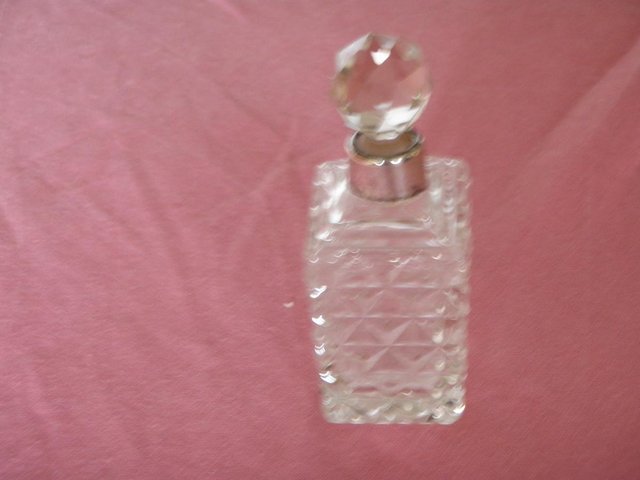 Image 2 of 2 glass scent bottles with silver neck collars and stoppers