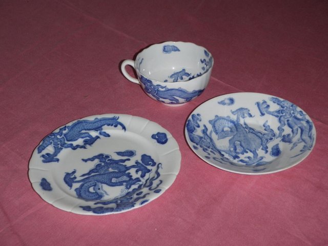 Preview of the first image of Blue and white cup saucer and plate with dragon design.