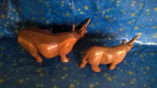 Preview of the first image of x2 Carved Wooden Rhino Ornaments.