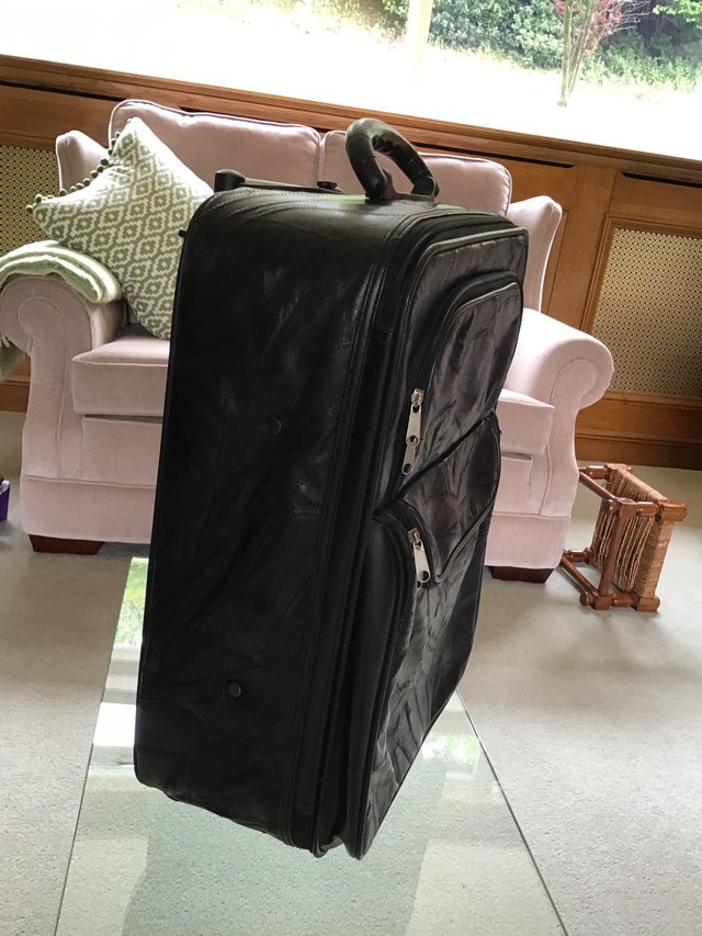 Image 3 of Leather suit case with wheels
