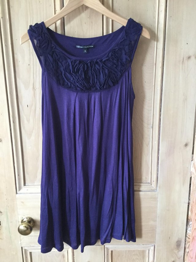 Preview of the first image of M&S Limited Collection Sz12 Deep Purple Ruffle Top.