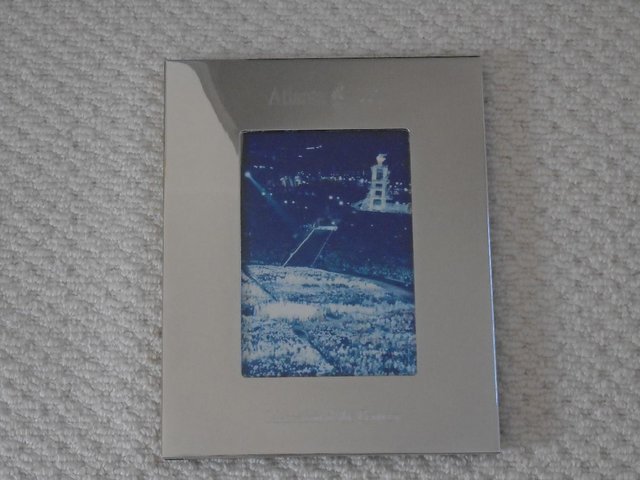 Preview of the first image of Silver photo frame commemorating the 1996 Atlanta Olympics.
