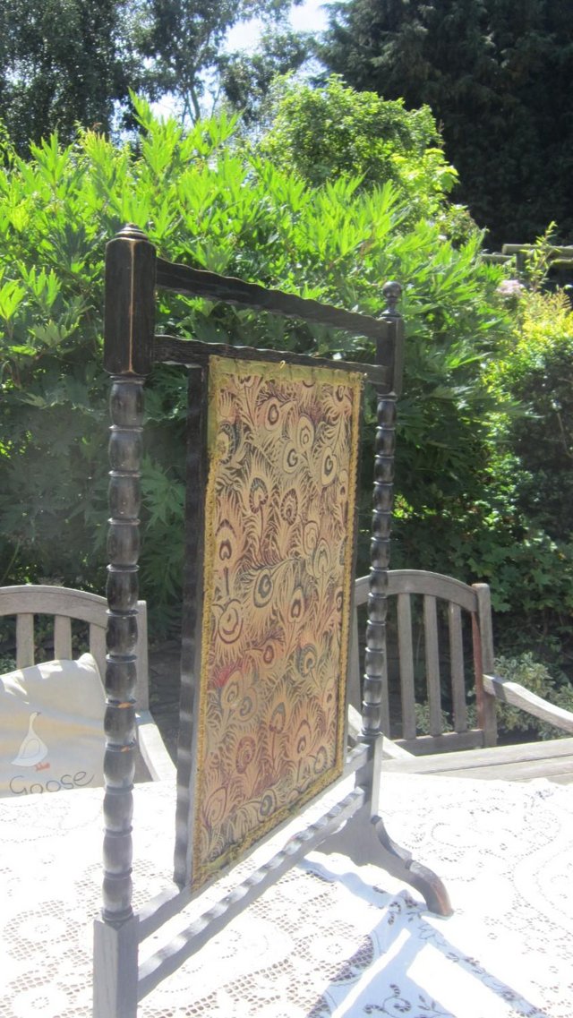 Preview of the first image of Antique fire screen stained oak  inner fabric inset.