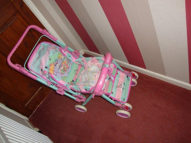 Image 2 of Pink Minnie mouse buggy