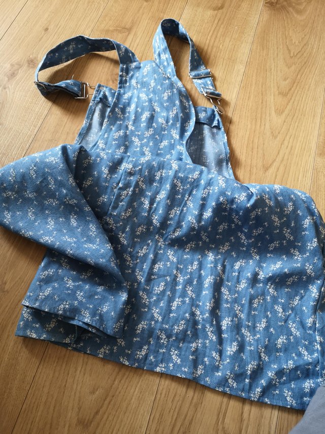 Preview of the first image of New Look light cotton pinafore mid blue size 14.