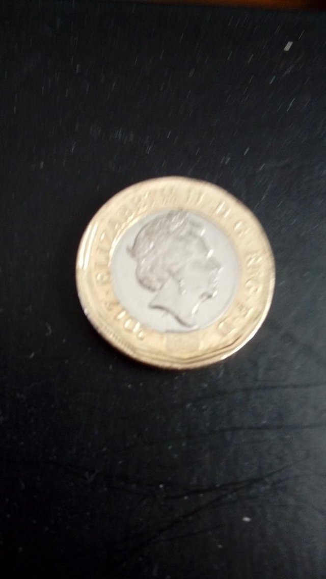 Preview of the first image of £1 coin thats got a missprinting fault date 2017.