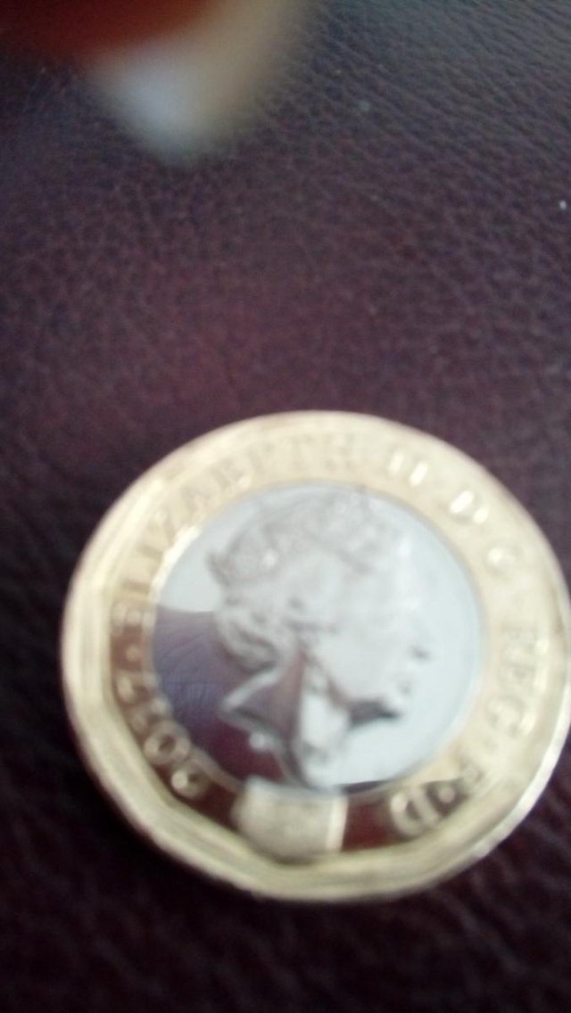 Image 14 of £1 coin thats got a missprinting fault date 2017