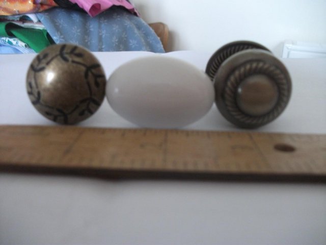 Preview of the first image of VINTAGE DOOR/CUPBOARD KNOBS.