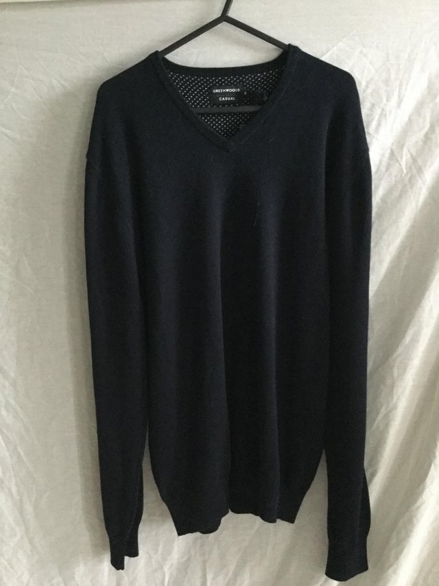 Preview of the first image of Brand new luxurious soft navy jumper.