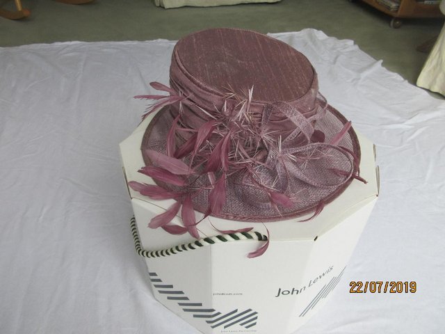 Preview of the first image of JOHN LEWIS HAT WITH ORIGINAL BOX..