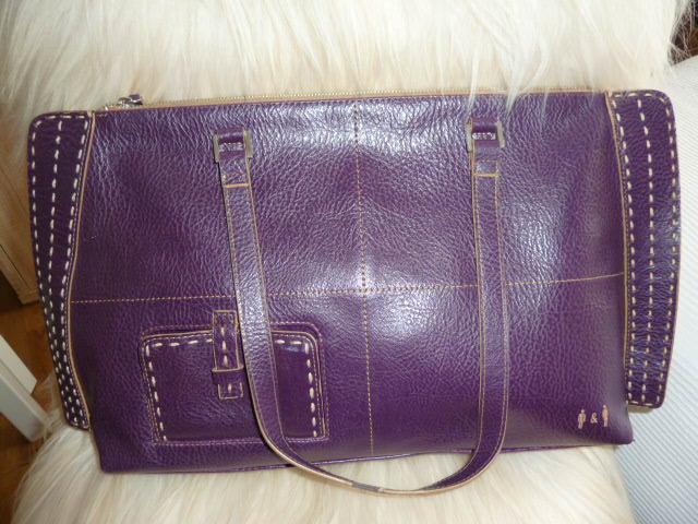 Preview of the first image of LADIES HANDBAG DARK PURPLE USED.