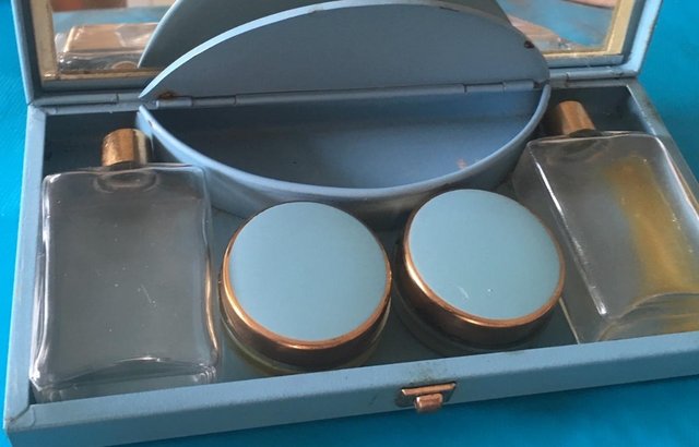 Preview of the first image of Vintage blue glass & enamel perfume grooming travel vanity s.