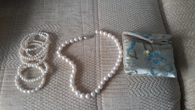 Preview of the first image of White pearl necklace with matching bracelets.