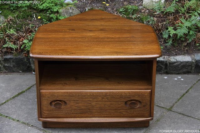Preview of the first image of ERCOL WINDSOR GOLDEN DAWN CORNER TV CABINET DVD STAND UNIT.