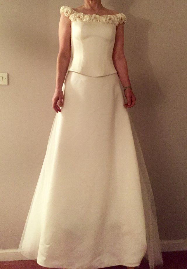Preview of the first image of Beautiful Pronuptia size 10 Wedding dress.