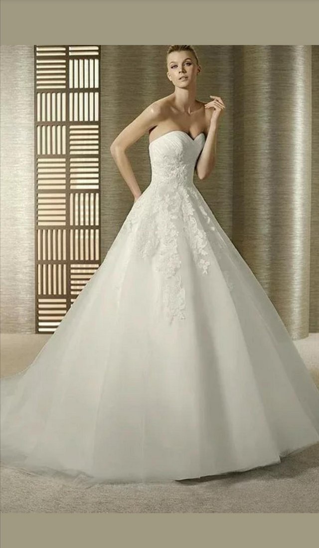 Preview of the first image of Pronovias White One Wedding Dress.