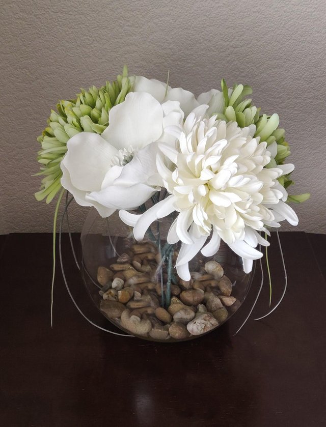 Preview of the first image of Beautiful Fish Bowl Flower Arrangement.