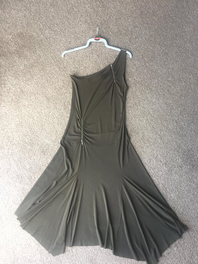 Preview of the first image of Khaki green one shoulder dress.