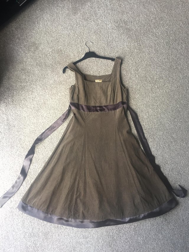 Preview of the first image of Tall brown cord dress.