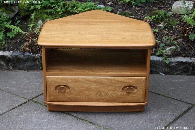 Preview of the first image of AN ERCOL WINDSOR LIGHT ELM CORNER TV CABINET DVD TABLE STAND.