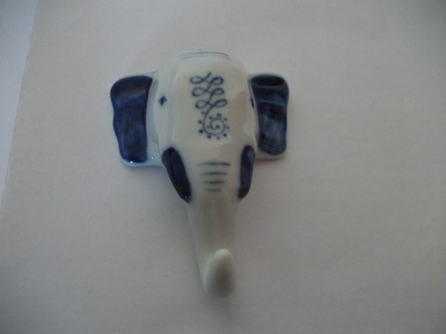 Preview of the first image of BLUE AND WHITE POTTERY HOOK.