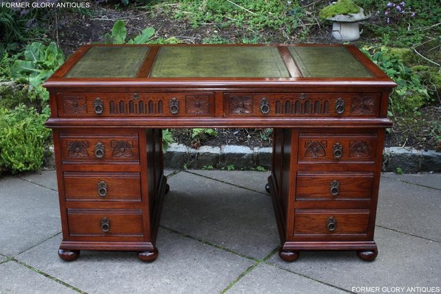 Preview of the first image of AN OLD CHARM TUDOR OAK PEDESTAL WRITING DESK COMPUTER TABLE.