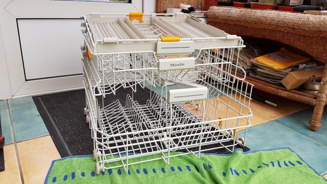 Preview of the first image of Fully adjustable Miele dishwasher baskets.
