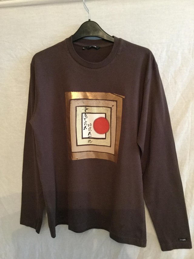 Preview of the first image of Designer long sleeve top by Peter Werth.