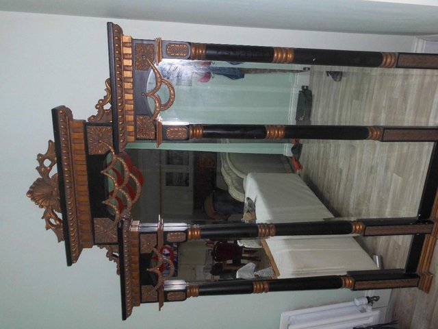 Preview of the first image of ANTIQUE MIRROR OVER 5FT TALL BLACK AND GOLD.