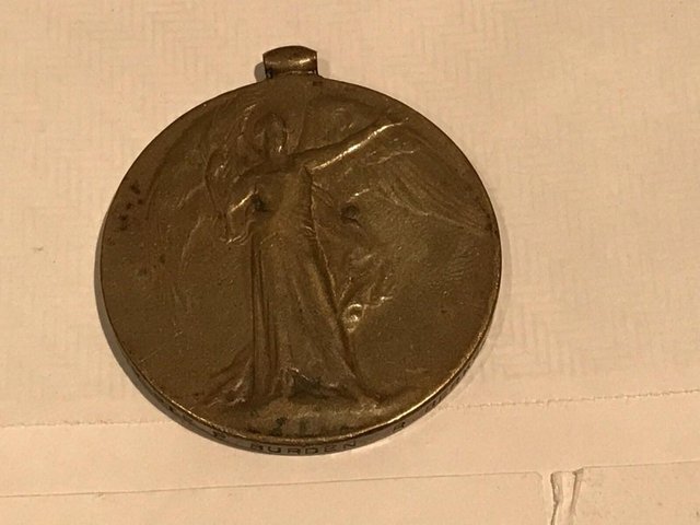 Preview of the first image of 1ww British Soldiers Medal For Service In The Great War.