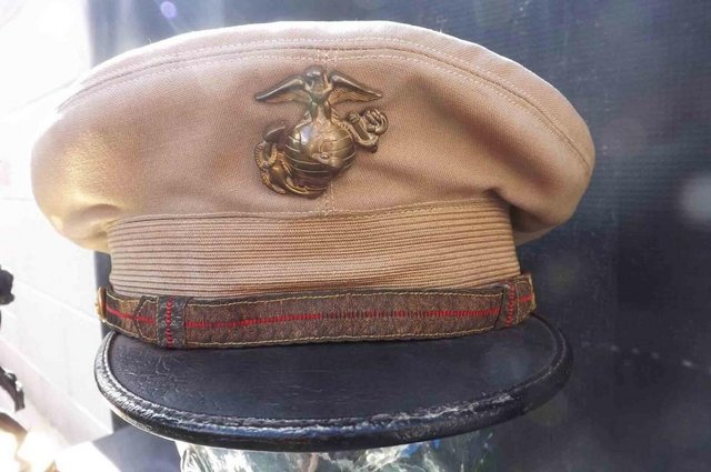 Preview of the first image of US Marine's hat and badge.