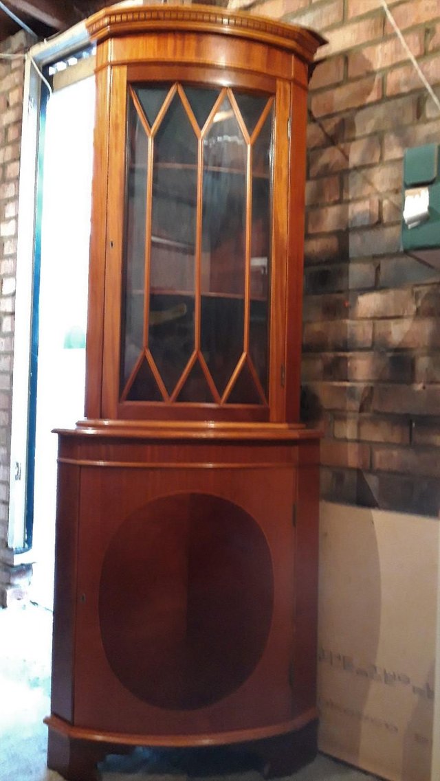 Preview of the first image of Beautiful Reproduction Walnut corner display cabinet.