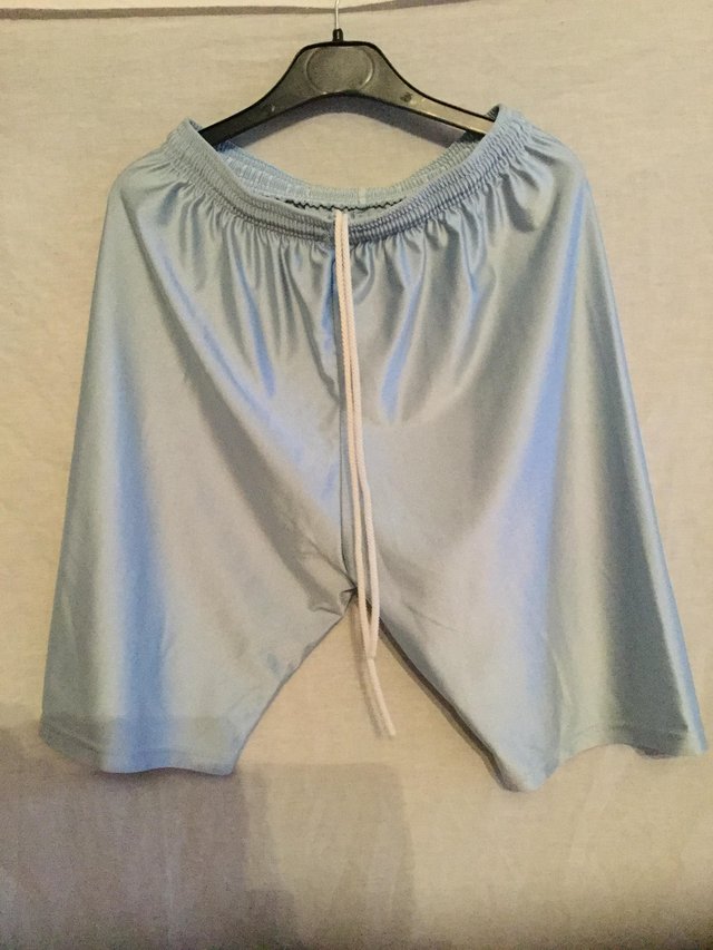 Preview of the first image of Diadora  baby blue unpadded cycle shorts.